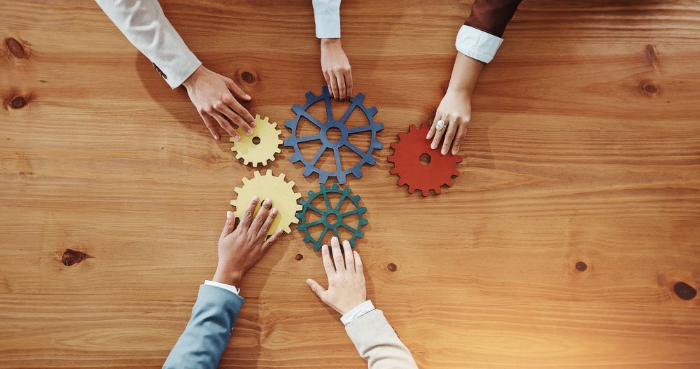 Business people, hands or cogs with gears for team building or problem solving.